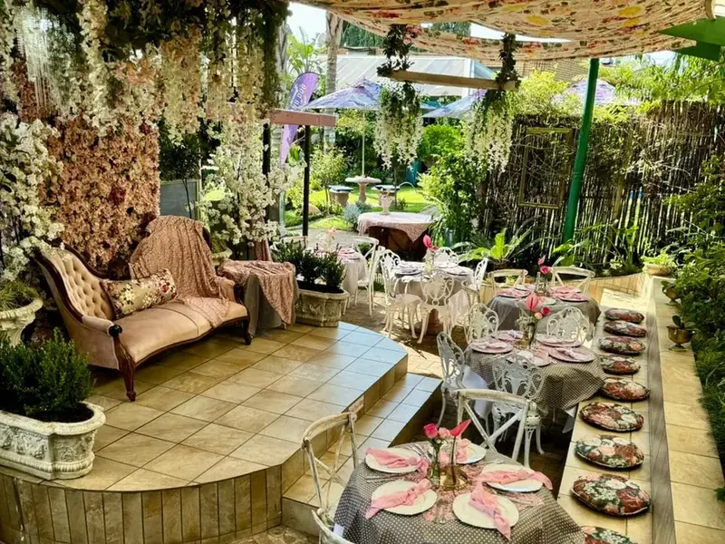 Outdoor garden seating at Anelli's coffee shop