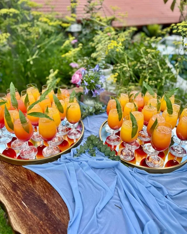 A welcome drinks table, styled to your choice
